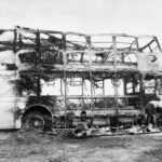 Emergency responders working near damaged passenger buses after a reported strike in Kramatorsk, eastern Ukraine.